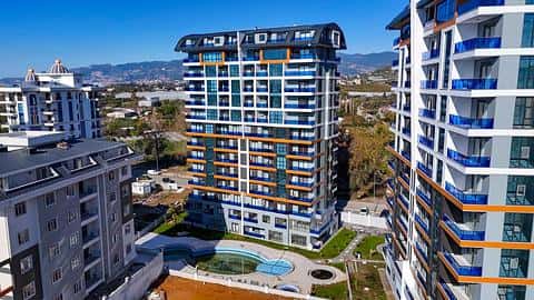 Appartement à vendre à Mahmutlar, Alanya : 3 chambres, piscine et vue sur la ville — 2/27