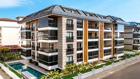 À vendre : appartements à Saray, Alanya avec piscine et proche de la plage — 4/45