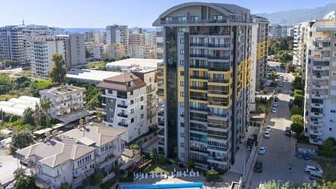Mieszkanie dwupokojowe na sprzedaż z basenem blisko morza w Mahmutlar, Alanya — 2/29