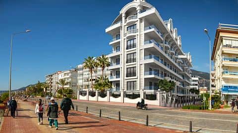 Premier ligne à la mer Appartement à vendre au centre d'Alanya | Revenus locatifs élevés — 4/48