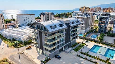 Apartamentet në Alanya Kargicak për Shitje - 1, 2, 3 Dhoma me Pishinë, Pranë Detit dhe Shtetësisë — 7/7