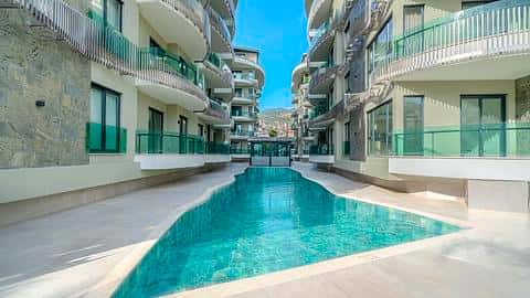 À vendre : appartements à Alanya dans un emplacement central avec piscine et proche de la mer — 10/60