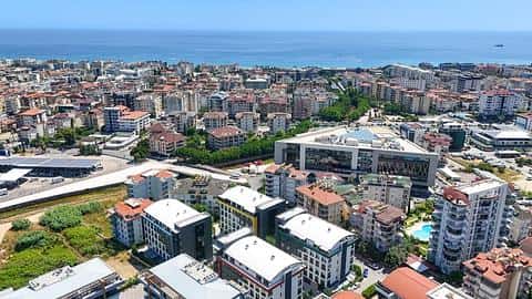 Magasin commercial spacieux éligible à la citoyenneté à vendre à Alanya Oba | Emplacement central | Revenu locatif élevé — 2/11