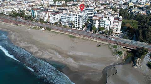 Premier ligne à la mer Appartement à vendre au centre d'Alanya | Revenus locatifs élevés — 5/48