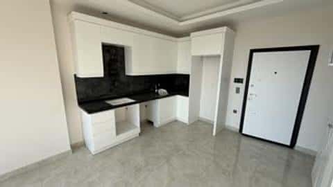 Appartement 1+1 Vue Sur Mer à Vendre au Centre de Mahmutlar Alanya — 9/22
