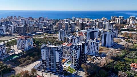 Appartement à vendre à Mahmutlar, Alanya : 3 chambres, piscine et vue sur la ville — 3/27