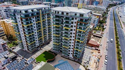 Investir dans un appartement de 2 chambres en première ligne de mer, vue sur la mer complète à Mahmutlar, Alanya — 3/27