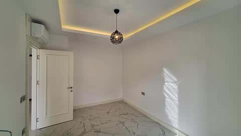 Appartements proposant la citoyenneté et une piscine dans le centre-ville d'Alanya — 8/11