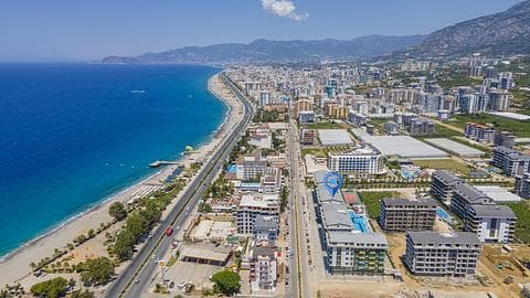 Appartement de 3 chambres avec vue sur la mer près de la plage à Kargicak, Alanya à vendre — 1/35