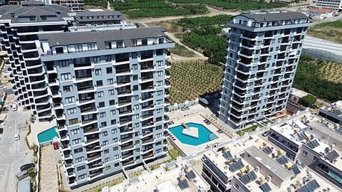 Opportunité d'investissement : Appartements de 1 à 2 chambres près du centre-ville à Mahmutlar — 1/24
