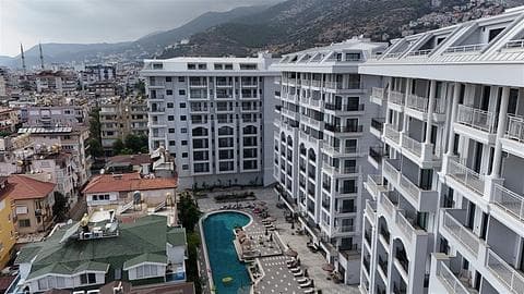 Appartements proposant la citoyenneté et une piscine dans le centre-ville d'Alanya — 1/11