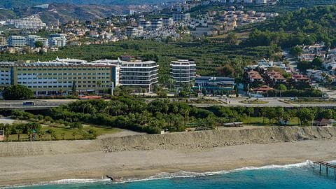 Appartement avec vue sur mer, comprenant piscine et sécurité à Alanya Kargicak, 2 et 3 chambres à vendre — 1/32