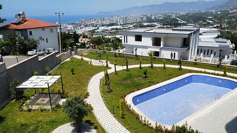 Opportunité d'investissement : appartements de 2, 3 et 4 chambres avec piscine dans le Kargicak d'Alanya — 1/17