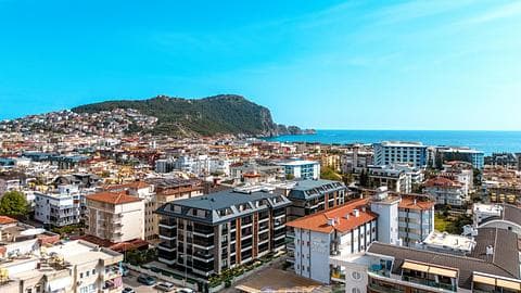 À vendre : appartements à Saray, Alanya avec piscine et proche de la plage — 1/45