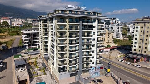 Achetez des appartements de 1, 2 ou 3 chambres à Alanya, Mahmutlar, avec piscine près de la mer — 1/27