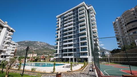 Appartement à Alanya Mahmutlar avec 1 à 5 chambres et piscine à vendre — 1/20