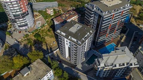 Opportunité d'investissement : appartements de 2 à 4 chambres avec piscine à Mahmutlar, Alanya — 1/33