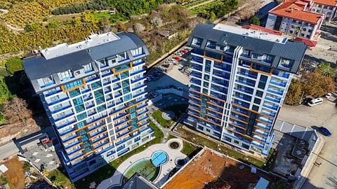 Appartement à vendre à Mahmutlar, Alanya : 3 chambres, piscine et vue sur la ville — 1/27